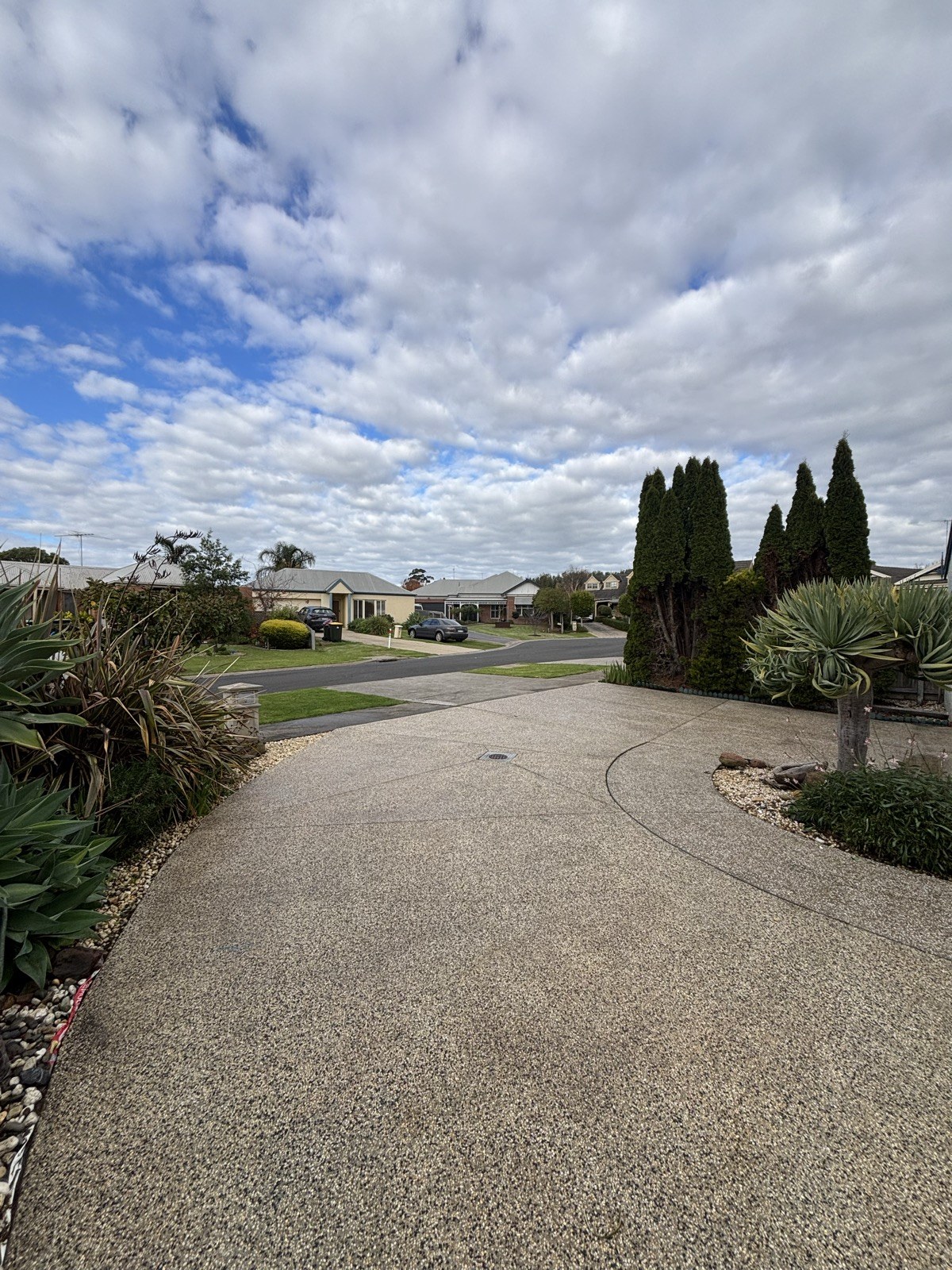 Exposed aggregate driveway cleaned by R&R Pressure Washing across Geelong and the Surf Coast