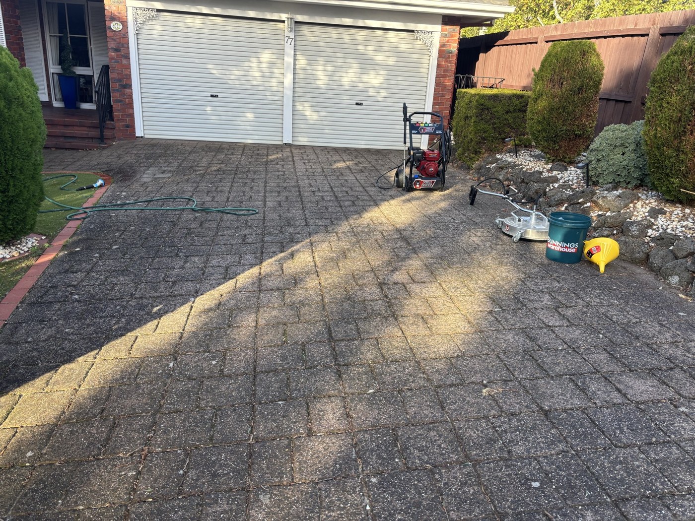 Paver driveway before cleaning